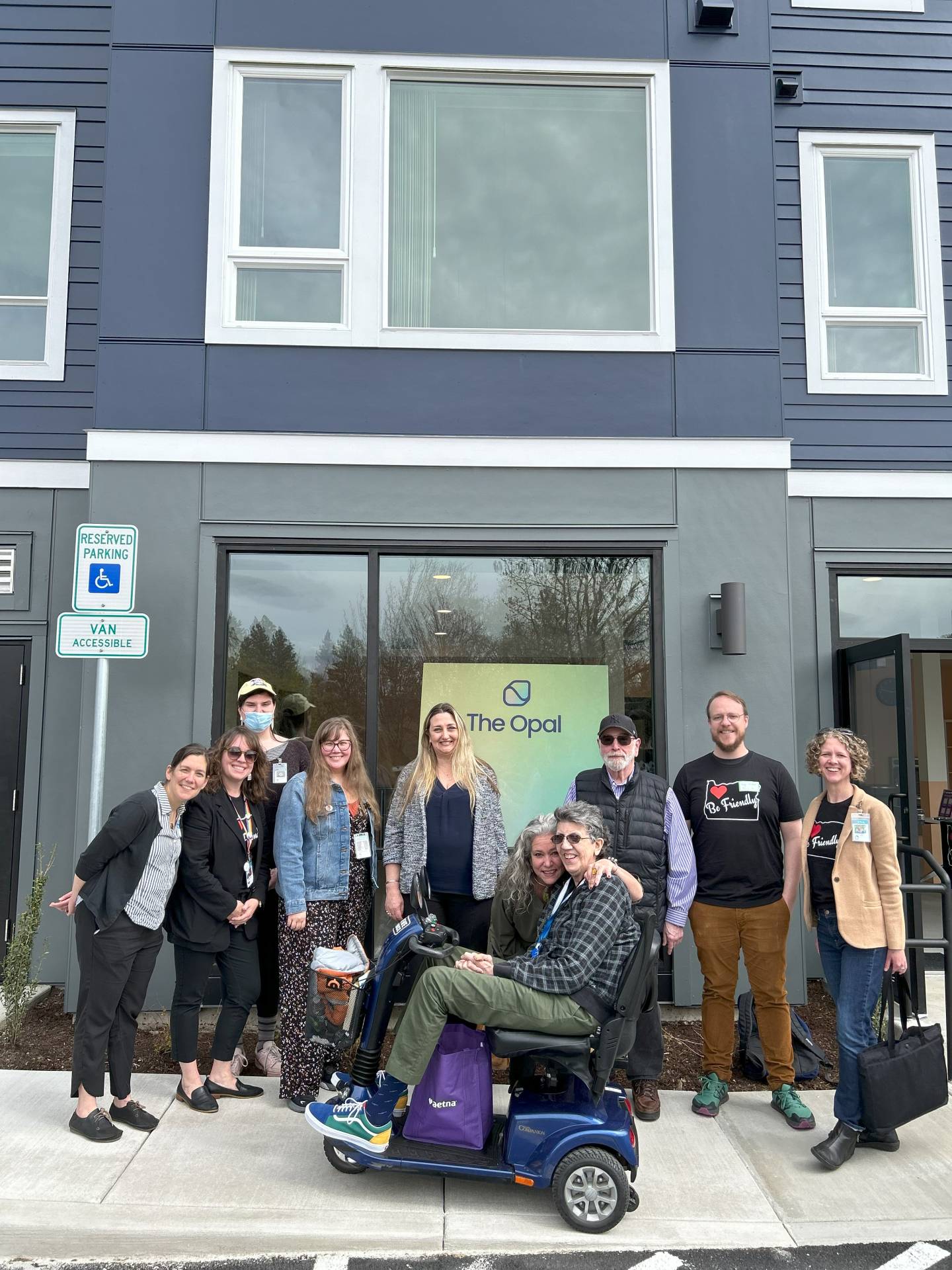 The Opal2 Friendly House staff and Elder Pride Services volunteers in front of The Opal on opening day.